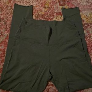 Green TNA leggings with raw ankle hem